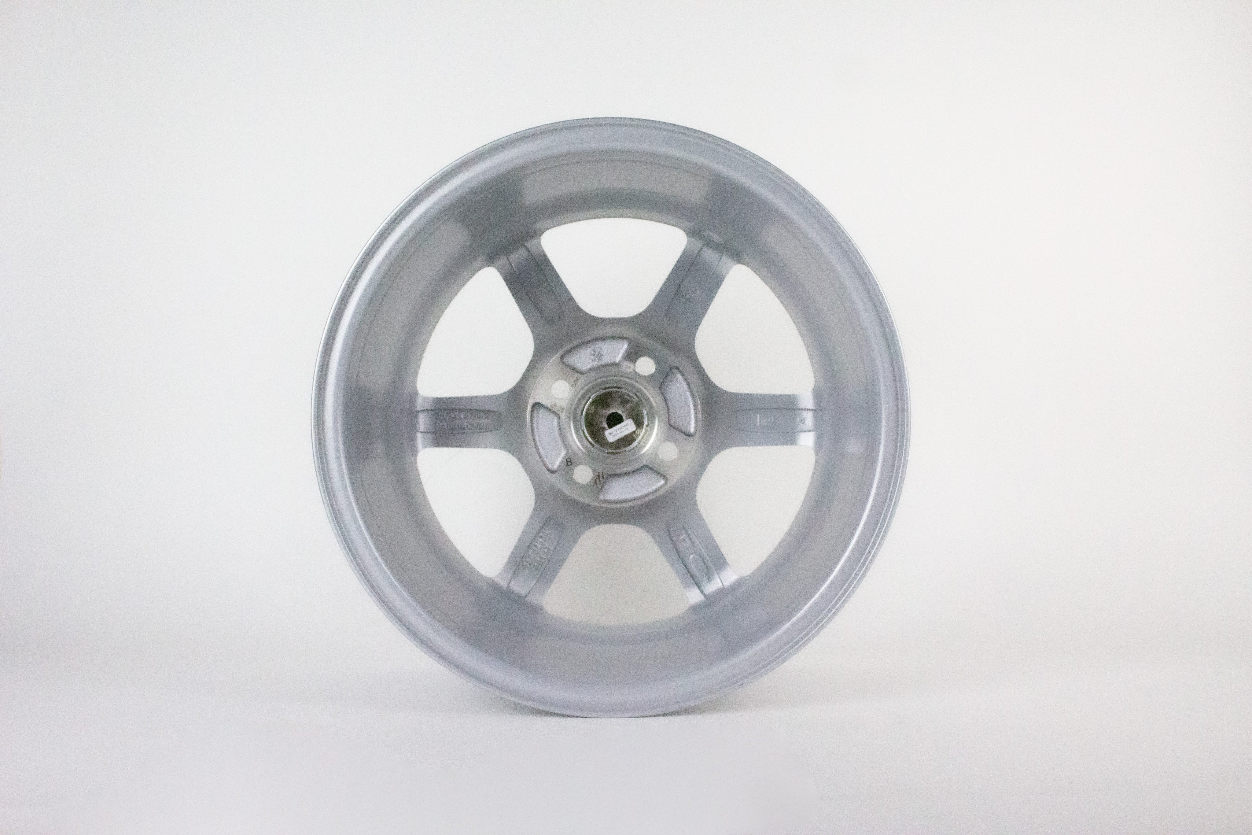 Silver wheel rim on a white background